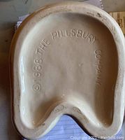 Bottom of jar showing stamp '1988 The Pillsbury Company'.