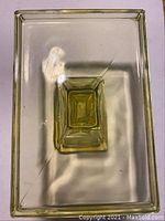 Top view showing rectangular shallow tray section with beveled edges and internal flaws resembling scratches.