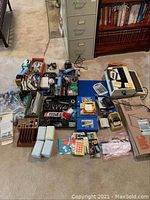 Full view of all office supplies including typewriter, calculators, desk organizers, files, stationery and other office items