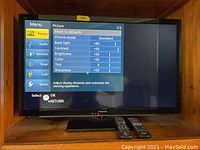 Panasonic 32-inch flat screen LCD TV powered on, showing picture menu settings.