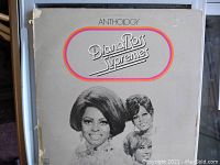Front cover of the 1974 Diana Ross & The Supremes Anthology vinyl LP showing album art and wear including torn corner.
