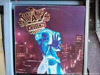 Photo of the Jethro Tull 'War Child' vinyl record album cover showing artwork and title.