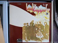 Front cover vinyl album Led Zeppelin II by Atlantic Records from 1969 with band photo in vintage uniforms.