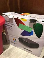 Box of Luminar L800 LED Smart Projector showing product branding and model.