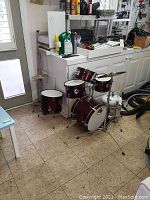 Full view of child's drum set showing bass drum, tom drums, and cymbals