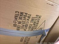 Photo of the cardboard box labeling showing SKU 101535, description 'Tree 2508', made in China, material PVC