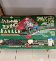 Front view of the Bachmann Big Hauler train set box with colorful artwork and features description.