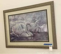 Front view of the framed swan art, showing the entire print and frame.