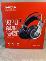 Box front showing MPOW EG3 PRO Gaming Headset with large image of headset and model number BH357A