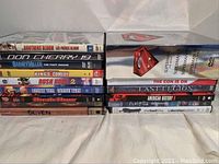 Photo showing additional DVDs including Superman The Movie, The Last Legion, American History X, and others.