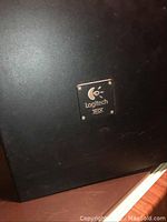 Front view showing Logitech and THX logos on subwoofer.