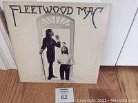 Front cover of Fleetwood Mac vinyl LP album with artwork of two men under an archway.