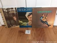 Three Gordon Lightfoot vinyl albums together showing front covers: 'Sit Down Young Stranger', 'Back Here on Earth', and 'Lightfoot!'