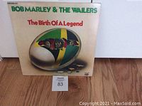 Front cover of The Birth of a Legend double LP by Bob Marley & The Wailers showing album title and cover art with Rastafarian colors and band images.