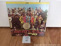 Front cover of The Beatles Sgt. Pepper's Lonely Hearts Club Band vinyl LP.