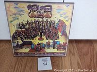 Front cover of the vinyl album showing artistic illustration of Procol Harum and Edmonton Symphony Orchestra at concert.