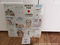 Front cover of the vinyl album showing the collage style artwork with John Lennon references and album title 'Shaved Fish'.