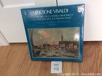 Front view of blue outer box with Venetian classical artwork and Edizione Vivaldi text.