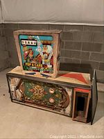 Overall view of disassembled backbox and lower cabinet pieces