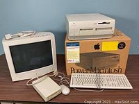 Desktop, monitor, keyboard, mouse, external drive and box