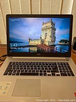 Open laptop showing 15.6" display and keyboard