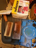 Photo of Wagner Power Painter Series 100 paint sprayer box showing product and label details.