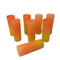 Eight orange to yellow gradient glass tumblers arranged in two groups with one glass laying down for full profile view on white background.
