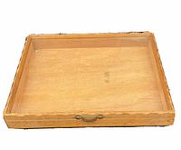 Closed view of the display case showing wooden frame and metal handle on front.