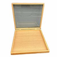 Open view of display case with wooden base and glass lid reflecting background.