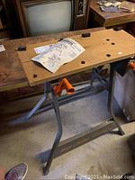 Photo of the Black & Decker Workmate portable workbench model 79-003 with wooden work surface and metal frame