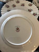 Photo showing underside of dessert plate with Royal Albert mark and pattern identification