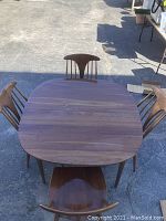 Full set from overhead showing table and four chairs