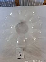 Top view of the large scalloped frosted glass bowl showing ridged pattern and shape.