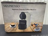 Closed box of MiXPRESSO espresso capsule coffee machine showing brand, model and coffee-themed graphics.