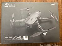 Sealed retail box front showing Holy Stone HS720E image and branding