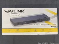 Photo of the closed-box packaging for Wavlink USB-C 4K Triple Display Docking Station showing product image and key features.