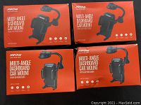 Four boxed Mpow Multi-Angle Dashboard Car Mounts in original packaging, arranged in a grid.