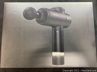 Box of the M3 Pro massage gun showing product image and name.