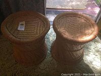 Two round stools or end tables made of rope and bamboo, showing the design and overall shape.