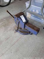 Blue Eron No. 150 bench vise on concrete floor, showing overall condition and size.