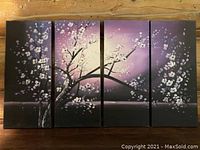 Image of five vertical oil paintings arranged side by side showing a cherry blossom branch with white flowers against a purple gradient background.