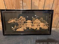 Full view of the large framed 3D art panel showing an Asian landscape scene with traditional architecture, trees, cranes, and birds.
