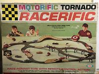 Box showing full Motorific Tornado Racerific slot car race track setup image with children playing, highlighting brand and model.