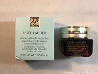 Photo of product box and jar showing Estee Lauder branding and product name.