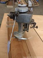 Front-side view showing clamp bracket, body casting and propeller