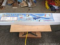 Photo of the long rectangular Kadet LT-25 model airplane kit box with the airplane artwork and title on top