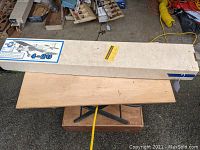 Box of Ace R/C 4-20 model airplane kit closed, showing top label and size.