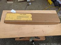 Original closed box of The Laughing Whale The Dory model boat kit with label and boat diagram.