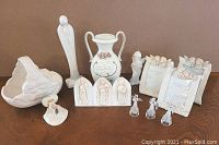 All items displayed showing complete set of angels and Mother Mary figurines including basket, vase, frames, candle, miniature angels, plaque