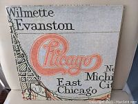 Front cover of the album showing map with Chicago and surrounding cities, in artistic typography and style.